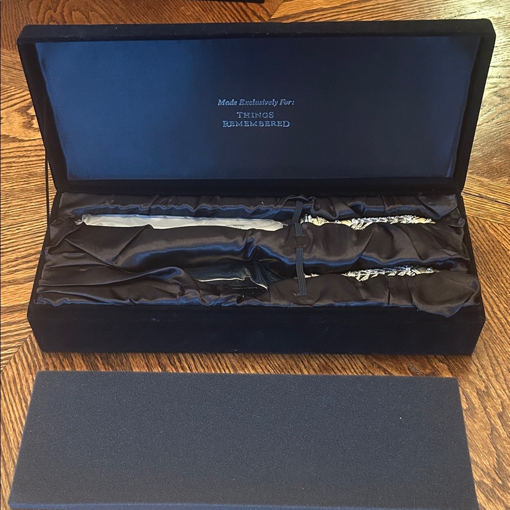 Things Remembered Swarovski goblets and cake cutter knife set.